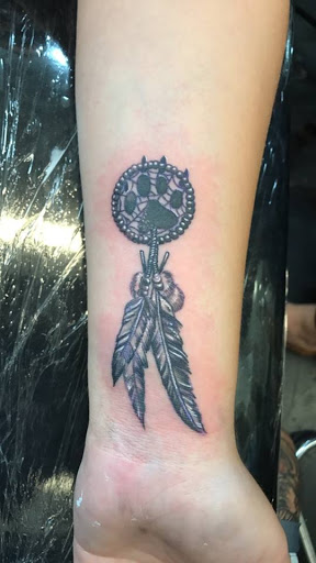 Explore kaws tattoo ideas, creative tattoo ideas in Modesto, available at Emerald Tattoo & Piercing - Modesto