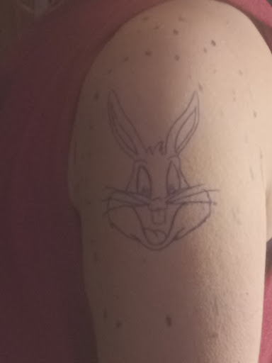 Explore tattoo ideas for epilepsy, creative tattoo ideas in Martin City, available at Big Kidz Ink Tattoo studio