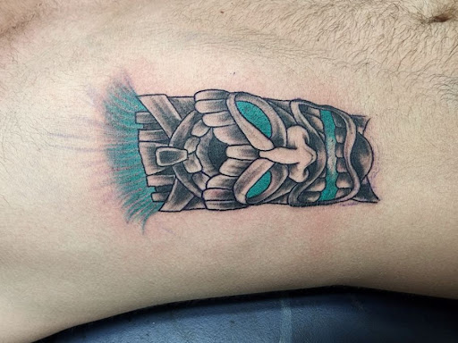 Explore electrical tattoos ideas, creative tattoo ideas in Foley, available at Symbolic Ink Tattoo Studio