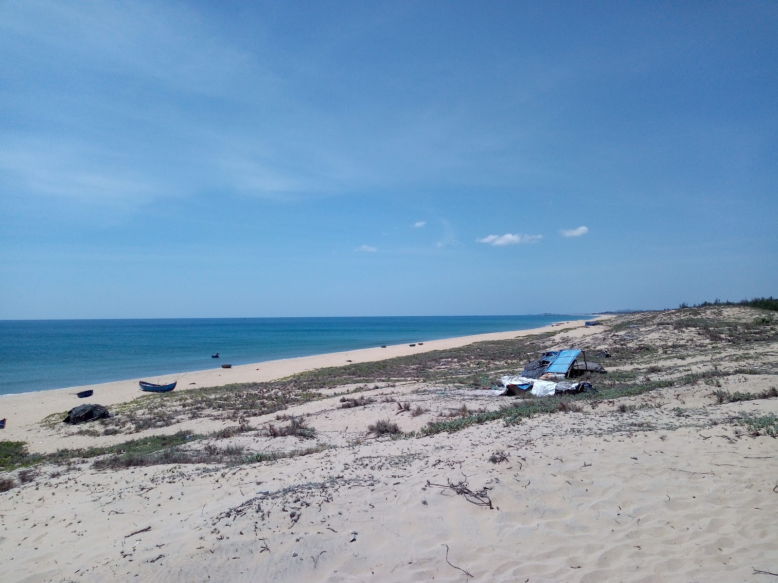Phu Hoa Beach的照片 带有明亮的沙子表面