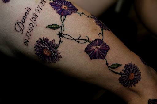 Explore dirtbike tattoo idea, creative tattoo ideas in Homosassa, available at Citrus Tattoos