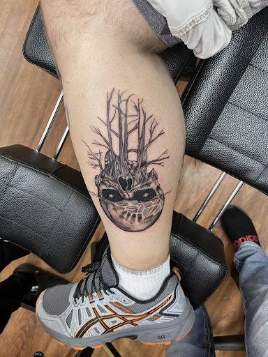 Explore majora's mask tattoo ideas, creative tattoo ideas in Cocoa, available at Rorschach Tattoo Shop and Piercing Studio