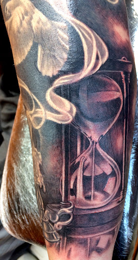 Explore candle tattoo ideas, creative tattoo ideas in Bayville, available at Hot Rod INKIN Tattoos, Piercing & Permanent Cosmetics