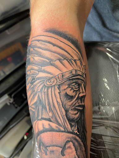 Explore blue bird tattoo ideas, creative tattoo ideas in Albany, available at Coast 2 Coast Body Art Studio