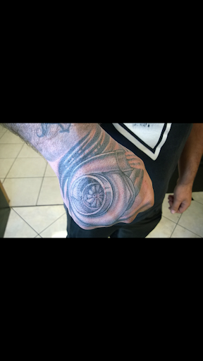 Explore leg tattoo ideas black male, creative tattoo ideas in San Marcos, available at Locally Famous Tattoo