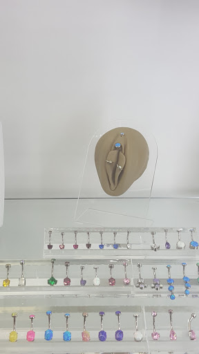 Explore women's arm sleeve tattoo ideas, creative tattoo ideas in Redondo Beach, available at Envy Body Piercing