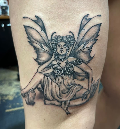 Explore back of the ear tattoo ideas, creative tattoo ideas in Pineville, available at Epic Ink Studio