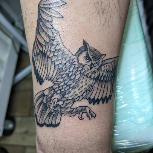 Explore owl tattoo ideas, creative tattoo ideas in Buford, available at Wild Tribe Tattoos and Piercings