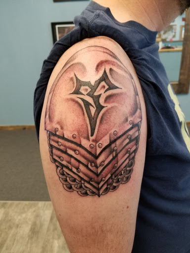 Find mother tattoo ideas for your next unique tattoo in South Bend at Marvel Tattoo & Piercing