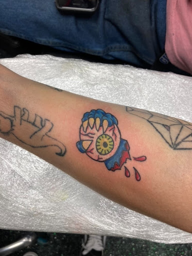 Explore tattoo ideas for older women, creative tattoo ideas in Slippery Rock, available at Dinky Dachshund Tattoo Parlor