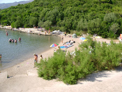 Punta Kriza beach'in fotoğrafı geniş ile birlikte
