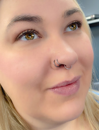 Explore tattoo ideas on neck, creative tattoo ideas in Springfield, available at Body Piercing By Qui Qui