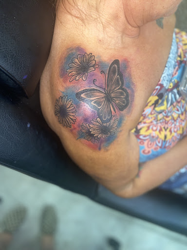 Explore smurf tattoo ideas, creative tattoo ideas in Paris, available at The Ink Gallery