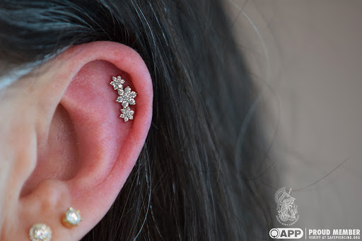 Explore black metal tattoo ideas, creative tattoo ideas in Pompano Beach, available at Athena Body Adornment