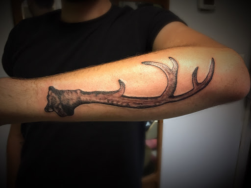 Explore negative tattoo ideas, creative tattoo ideas in Washington, available at Fattys Tattoos & Piercings H Street