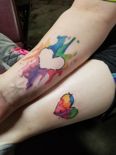 Explore fist tattoo ideas, creative tattoo ideas in Paducah, available at Third Moon Tattoos
