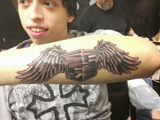 Find bird tattoo idea for your next unique tattoo in Blue Island at Lil Smittys Tattoo Magic