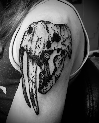 Find armband tattoo ideas for your next unique tattoo in North Tonawanda at Dark Side Ink Tattoo Studio