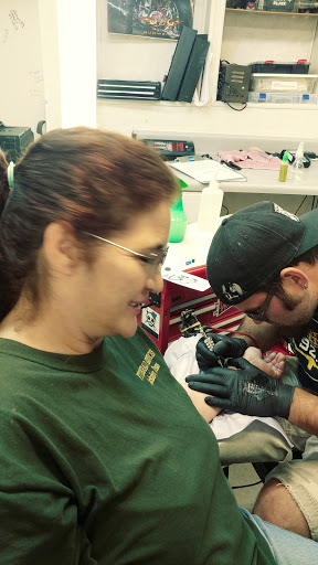 Explore tattoo ideas for writers, creative tattoo ideas in Graham, available at Tattoo Haus