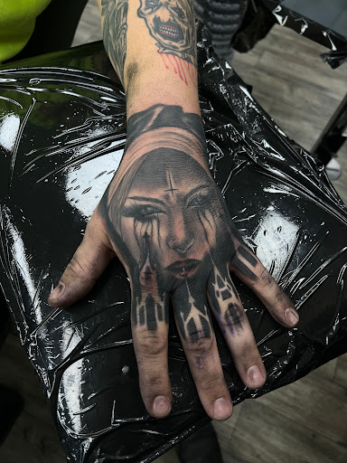 Explore inner bicep tattoo ideas for guys, creative tattoo ideas in Steubenville, available at Garloch Tattooing