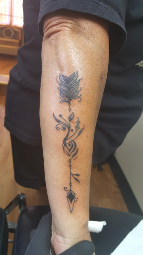 Explore birthday month tattoo ideas, creative tattoo ideas in Fort Worth, available at Randy Adams Tattoo Studio