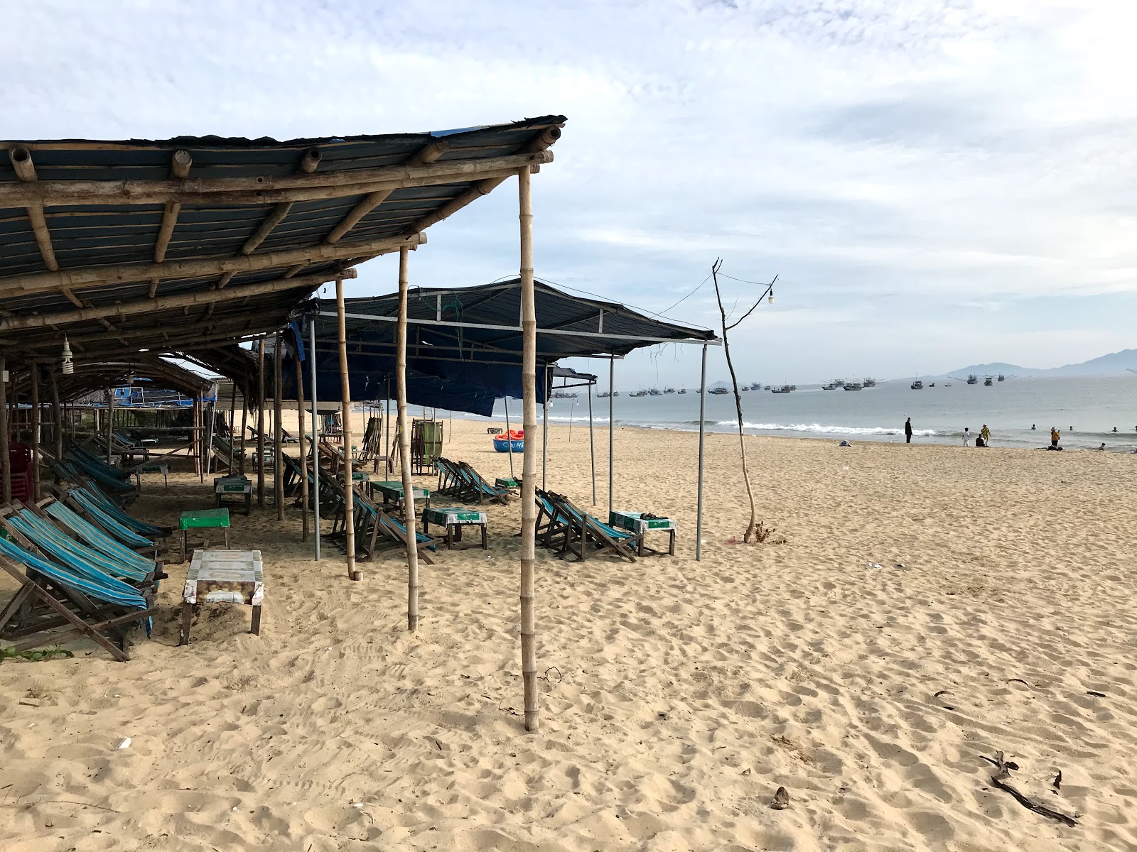 Foto von Binh Minh Beach und die siedlung