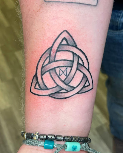 Explore cover up tattoo ideas female arm, creative tattoo ideas in Watford City, available at Soulful Ink Studios
