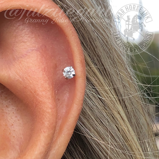 Explore tattoo ideas for kids names, creative tattoo ideas in Kent, available at War Horse Ink