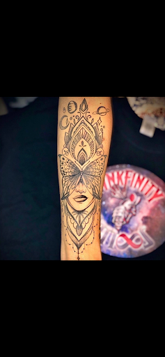 Explore coldplay tattoo ideas, creative tattoo ideas in Boca Raton, available at Inkfinity Tattoo & Piercings Shop