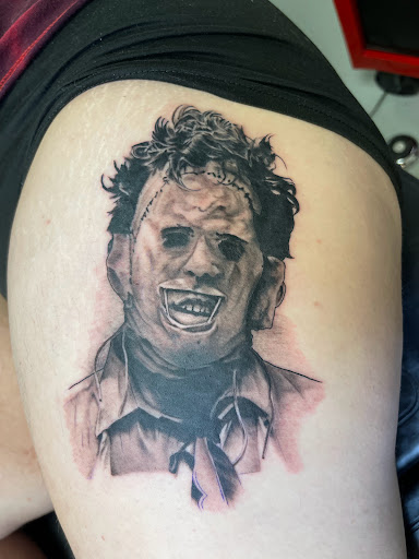 Explore one piece tattoos ideas, creative tattoo ideas in Marietta, available at Monkeys Uncle Tattoo