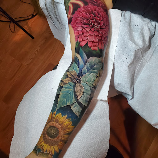 Explore women tattoo ideas back, creative tattoo ideas in Pueblo, available at Spellbound Electric Tattoos