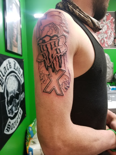 Explore men chest tattoo ideas, creative tattoo ideas in Barre, available at Bury The Needle Tattoo