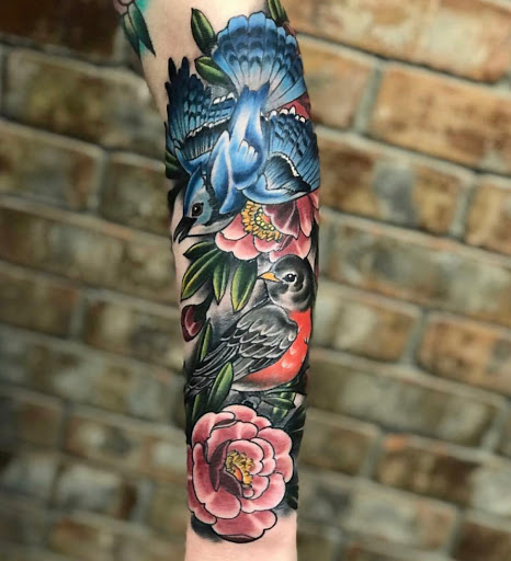 Explore miami dolphins tattoo ideas, creative tattoo ideas in Spokane, available at Anchored Art Tattoo