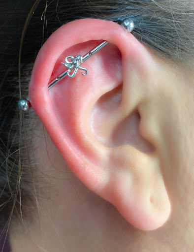 Explore barbell tattoo ideas, creative tattoo ideas in Springfield, available at Body Piercing By Qui Qui