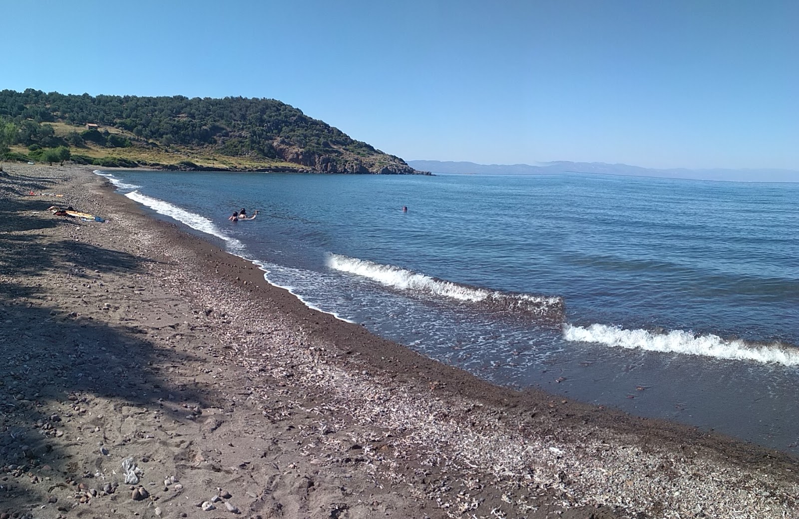 Foto av Lagadas beach och dess vackra landskap