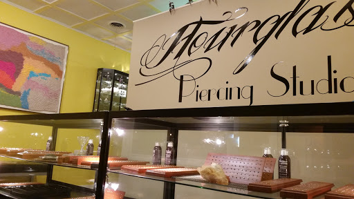 Explore photographer tattoo ideas, creative tattoo ideas in Saginaw, available at Hourglass Piercing Studio