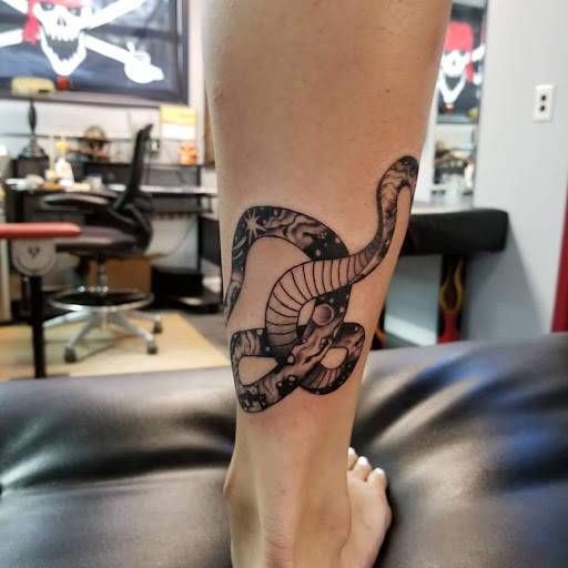 Explore foot print tattoo ideas, creative tattoo ideas in Yorktown, available at Army Navy Tattoo