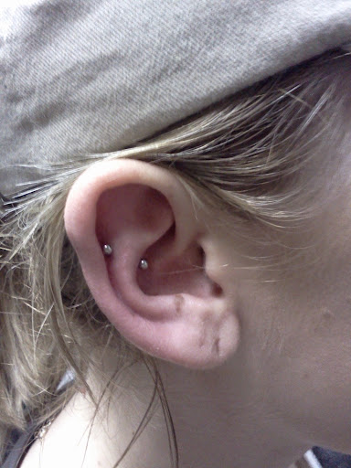 Explore back of the leg tattoo ideas, creative tattoo ideas in Summerville, available at Exotic Impressions Body Piercing