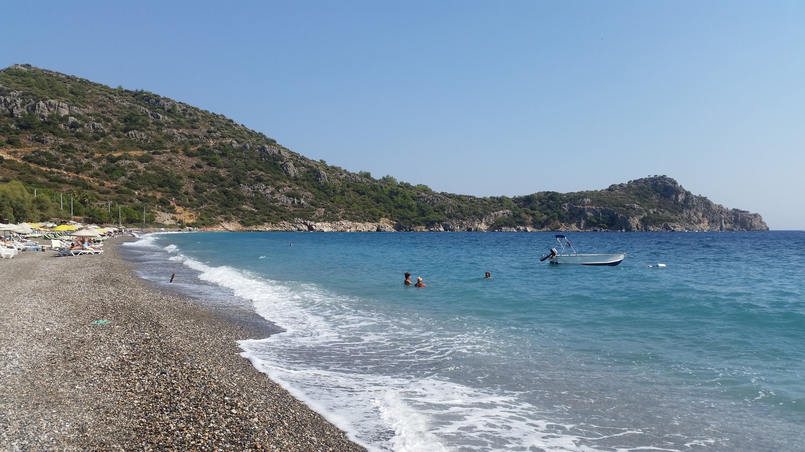 Ovabuku beach的照片 带有宽敞的海湾