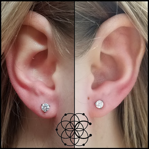 Explore women's wrist tattoo ideas, creative tattoo ideas in Sarasota, available at Z-Edge Tattoo & Body Piercing South Shop