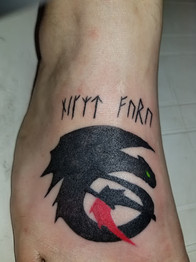 Explore disco elysium tattoo ideas, creative tattoo ideas in Onalaska, available at Divine Designs tattoo studio