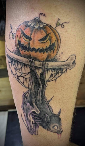 Explore graffiti tattoo ideas, creative tattoo ideas in Medina, available at Madhouse ink tattoo