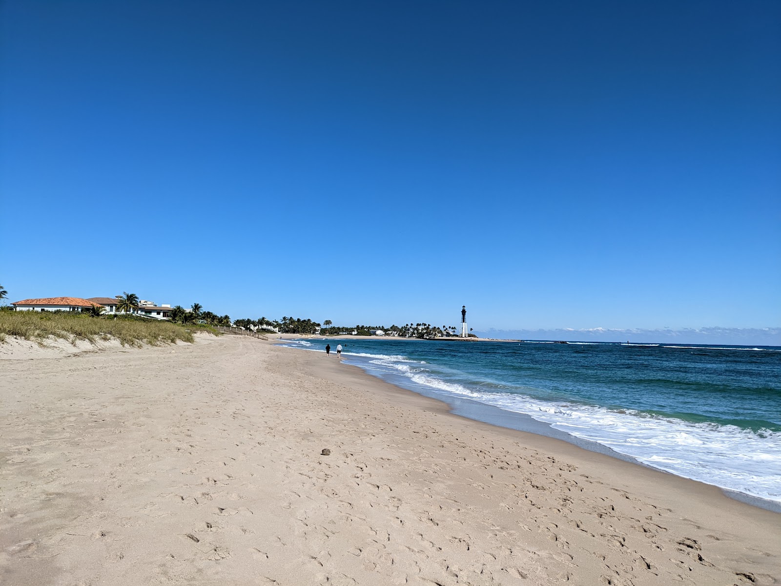 Pompano beach II的照片 带有碧绿色水表面