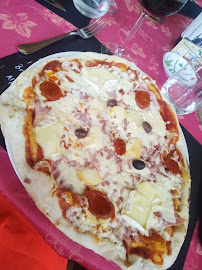 Pizza du Pizzeria Chez Alain : Pizza et plats à emporter uniquement de 11 h à 13 h et de 18 h à 21 h 30 Tous les jours à Fouesnant - n°18