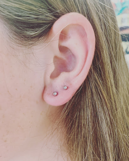 Explore womens thigh tattoo ideas, creative tattoo ideas in Round Rock, available at Piercings by Toni