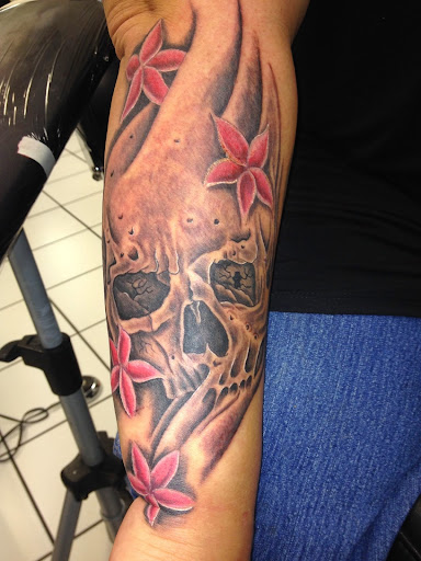 Find time clock tattoo ideas for your next unique tattoo in Russellville at Big Country Tattoos