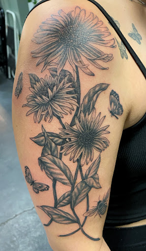 Explore tricep tattoo ideas for men, creative tattoo ideas in Raleigh, available at Raleigh Tattoo Company