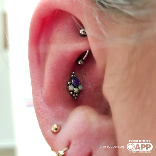 Explore word tattoo cover up ideas, creative tattoo ideas in Fort Myers, available at Tiger Lotus Tattoo and Piercing