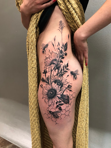 Explore grandson tattoo ideas, creative tattoo ideas in Sauk City, available at The Madison Tattoo Company