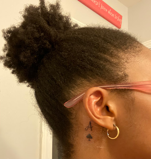 Explore lower back tattoo ideas for men, creative tattoo ideas in Atlanta, available at Black Cloud Tattoo and Piercing